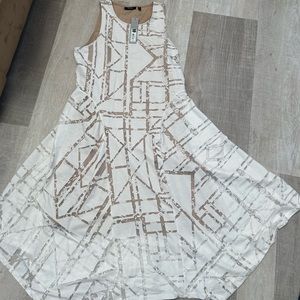 APT 9 sleveless flair dress . New with tags , white with beige lining.